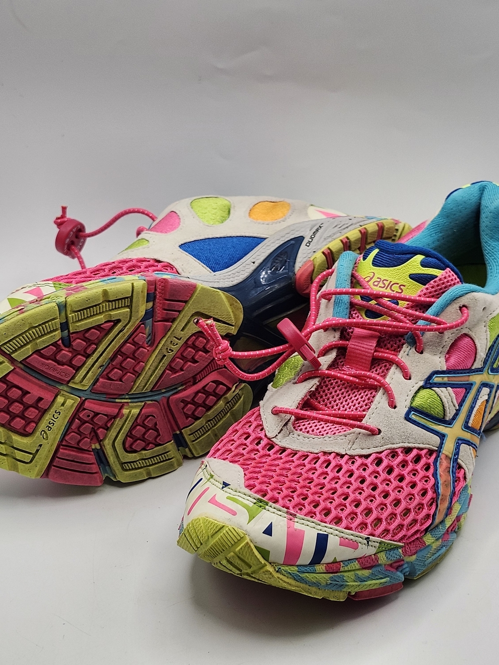 ASICS T264N Gel Tri 7 Noosa Pink Sneakers with Neon Green, Blue & Yellow Accents